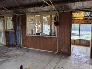Internal partition wall starting to be stripped back