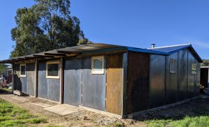 South-west corner with a well weathered sheet