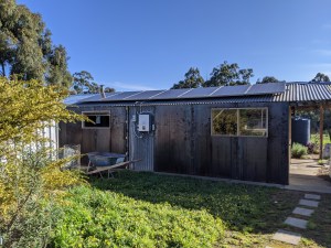 Eastern wall cladded up, only the solar box remains to be fitted out in checker plate